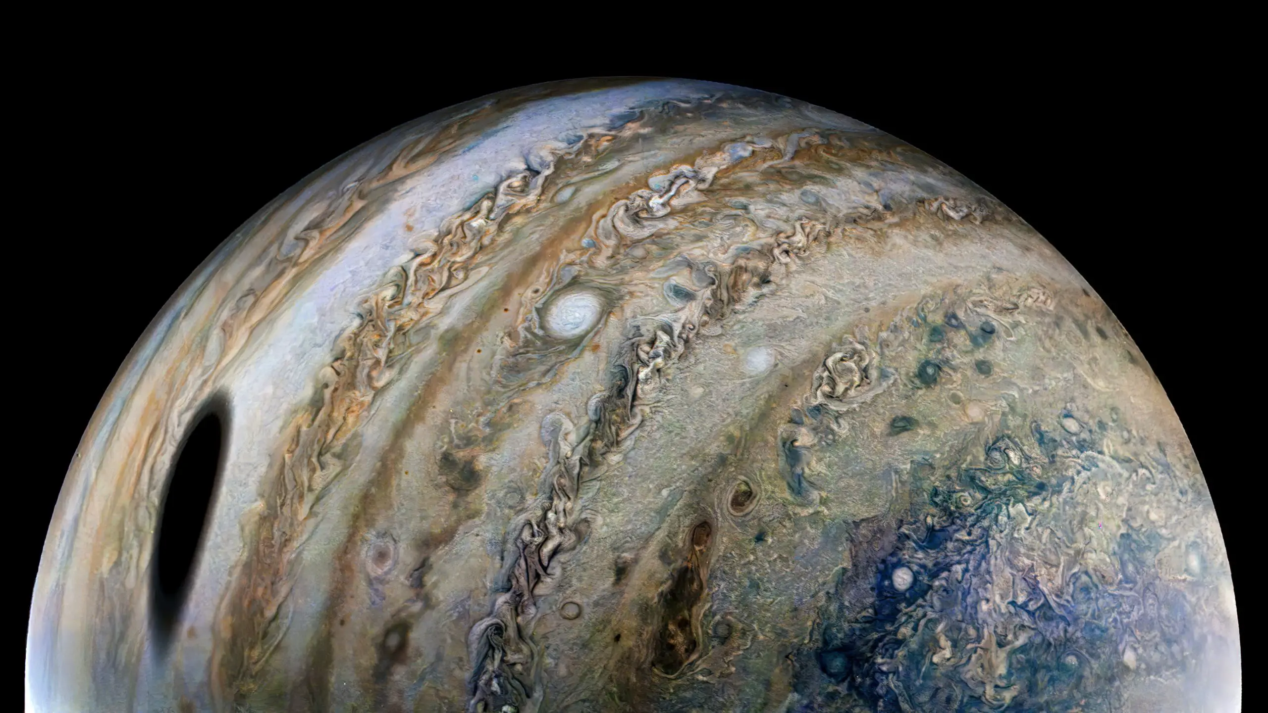 Jupiter's largest moon Ganymede casts a large shadow